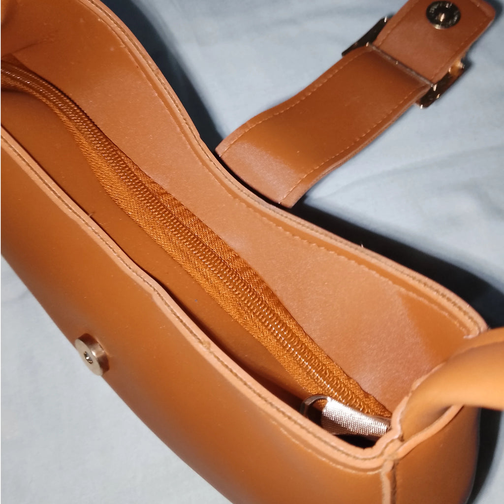 brown buckled handbag