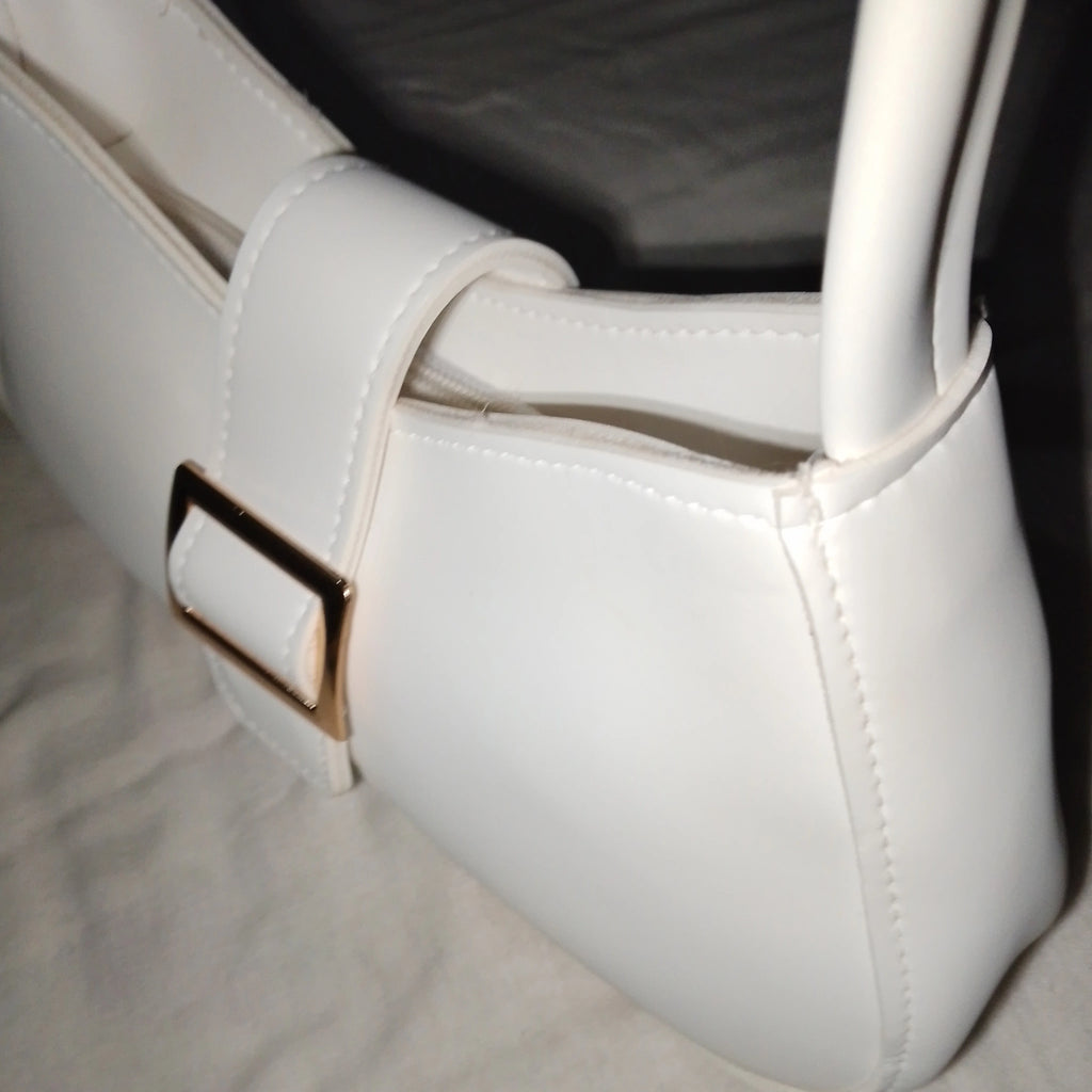 buckled white handbag