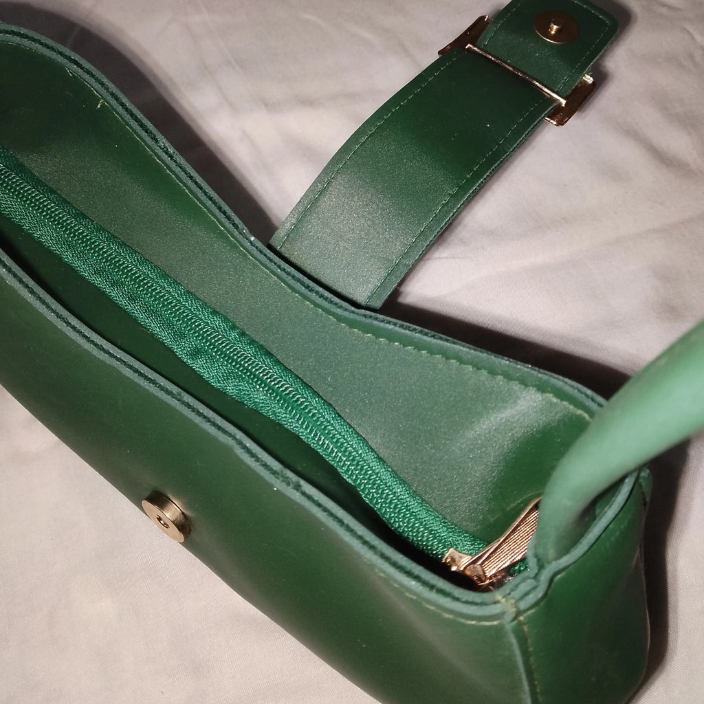 green buckled handbag