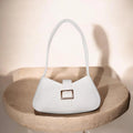 buckled white handbag