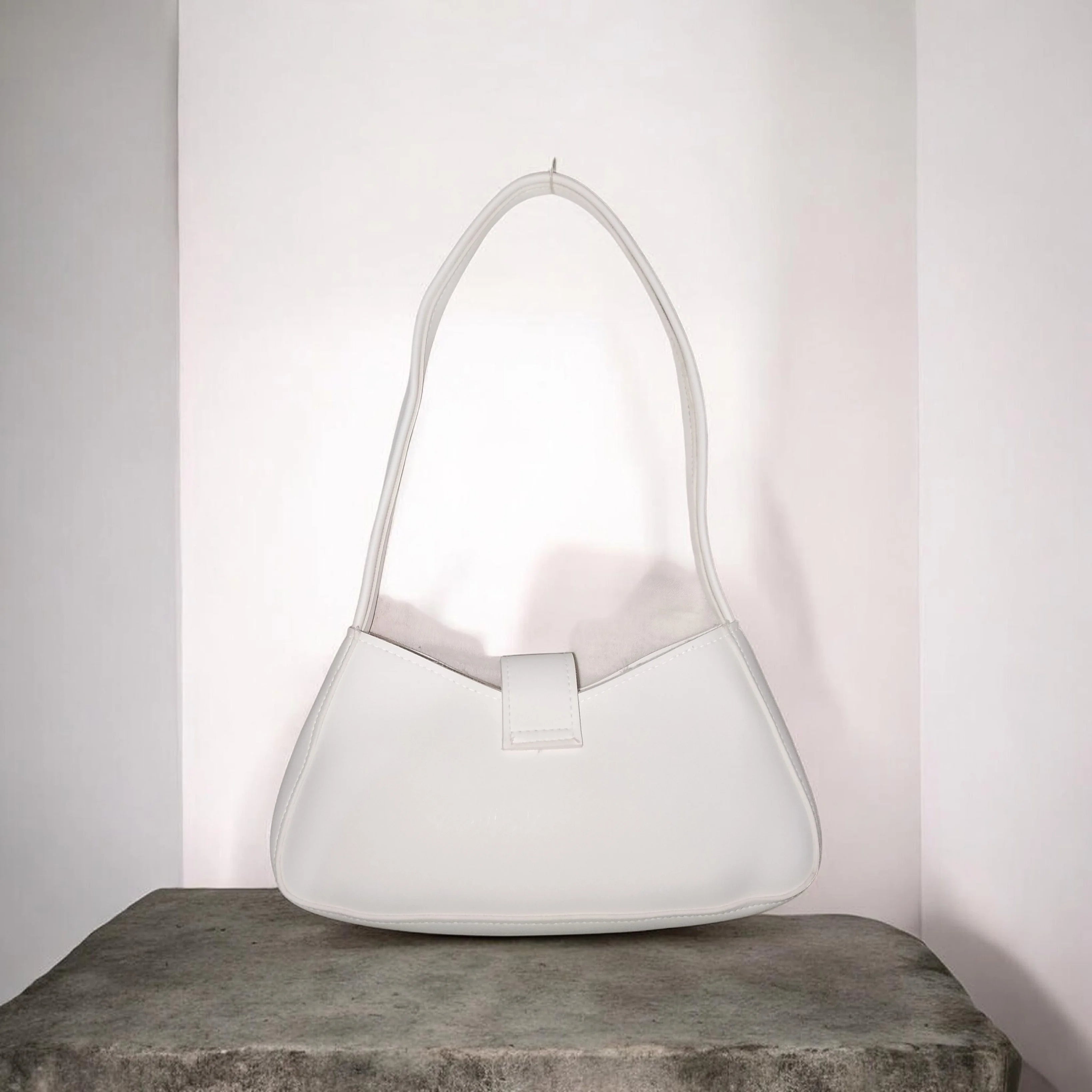 buckled white handbag
