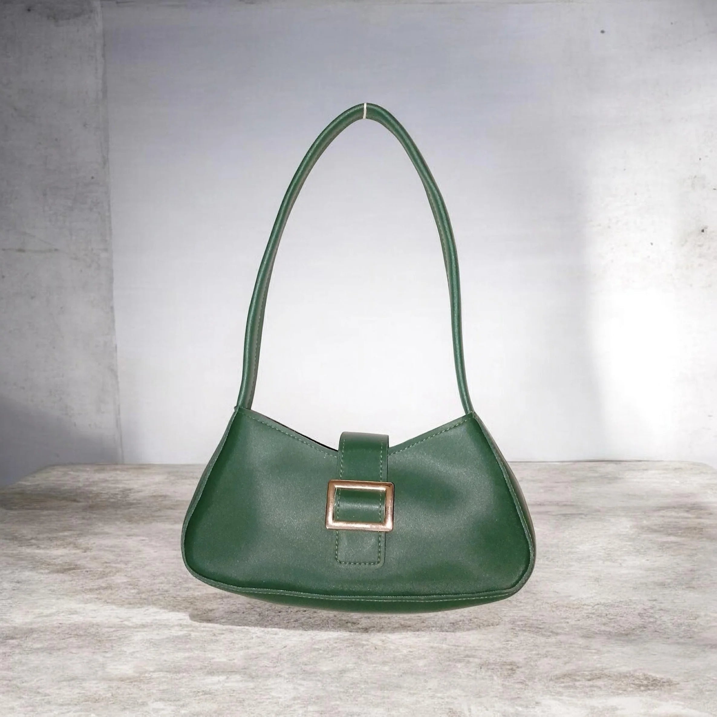 green buckled handbag