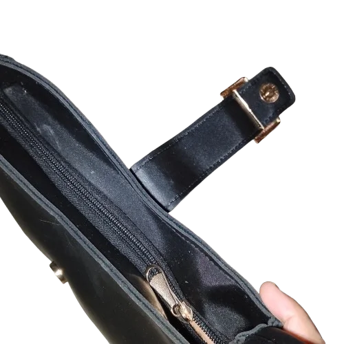 black buckled handbag