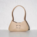 beige buckled handbag