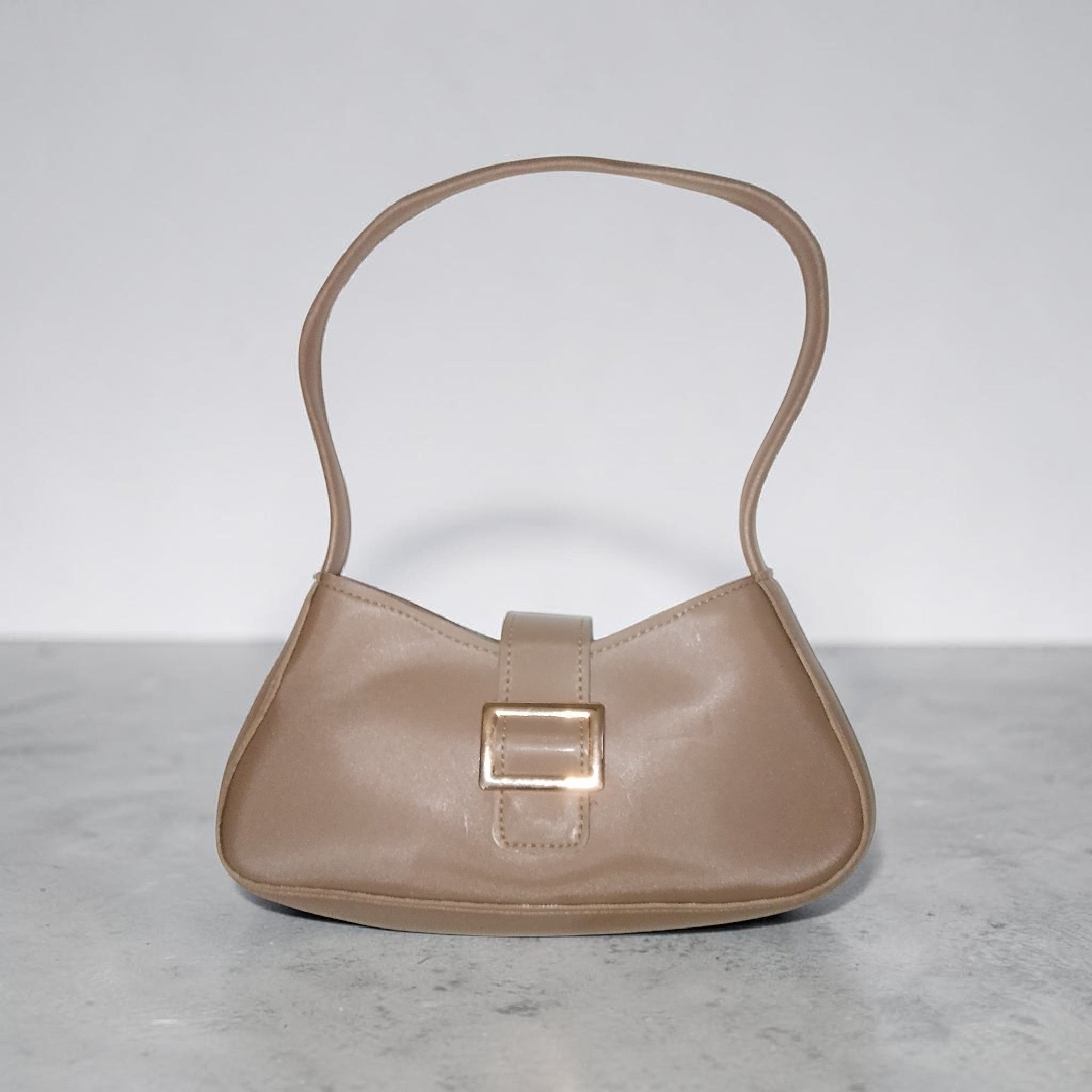 sand dust buckled handbag