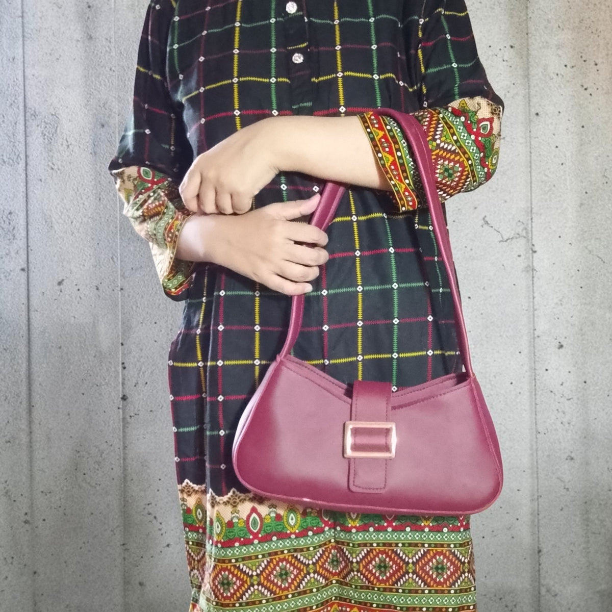 maroon buckled handbag