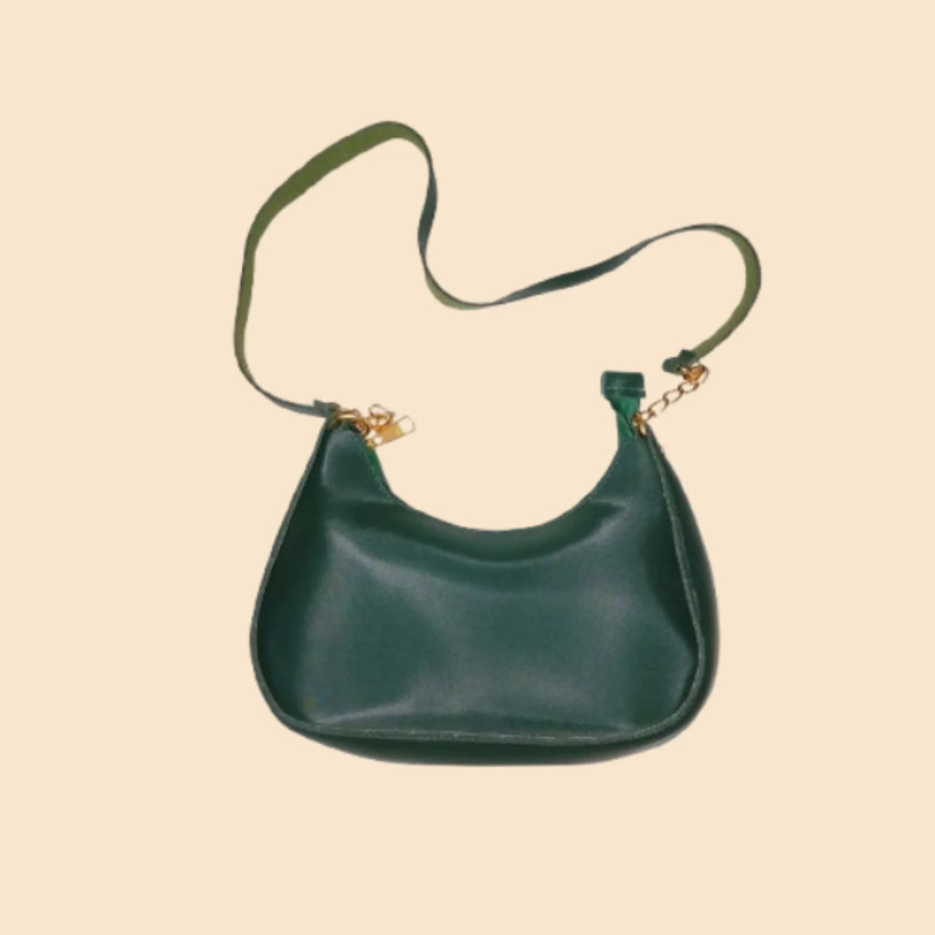 Crisscross green handbag