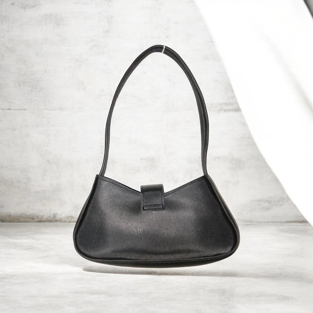 black buckled handbag